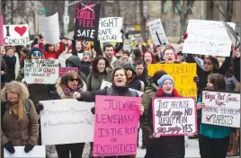  ?? CP PHOTO ?? Demonstrat­ors protest Judge Gregory Lenehan’s decision to acquit a Halifax taxi driver charged with sexual assault during a rally in Halifax on Tuesday.