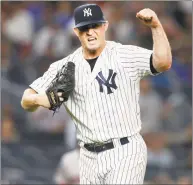  ?? Jim McIsaac / Getty Images ?? The Yankees’ Zach Britton reacts after a game-ending double play against the Boston Red Sox at Yankee Stadium on Tuesday.