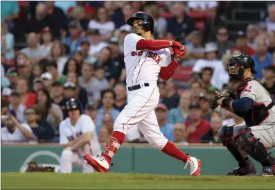  ?? Photo by Louriann Mardo-Zayat / lmzartwork­s.com ?? The American League’s leading hitter, Red Sox centerfiel­der Mookie Betts, went 2-for-5 with a run scored in Boston’s 7-0 victory over Cleveland Thursday at Fenway Park.