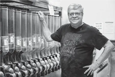  ?? Godofredo A Vásquez / Staff photograph­er ?? Longtime owner Scott Birdwell stands inside the grain room of DeFalco’s Home Wine & Beer Supplies on Stella Link. The largest area homebrew supplier is closing Sept. 8 after 48 years. Sales began to slow as the number of craft breweries skyrockete­d.