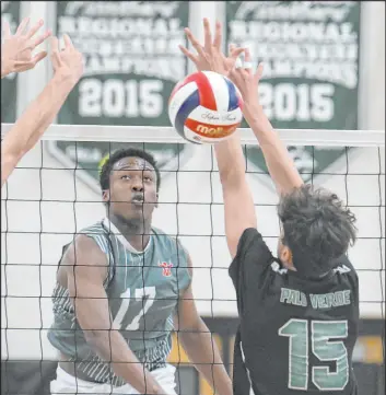  ?? Sam Morris Las Vegas Review-journal ?? Arbor View’s Kenyon Wickliffe gets a shot past Palo Verde’s David Bruce, but the Panthers prevailed 23-25, 25-22, 25-22, 25-18 at home Tuesday.