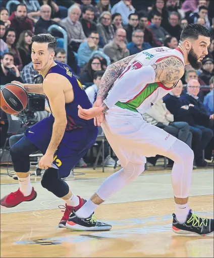  ?? FOTO: MANEL MONTILLA ?? Thomas Heurtel, por detrás de Vincent Poirier. El base francés del Barça volvió a demostrar su buen momento de forma