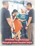  ??  ?? DITAHAN: Suspek berjaya ditangkap untuk siasatan lanjut.