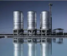  ??  ?? MIDDLE RIGHT: Compounds extracted from the brine are stored in large silos