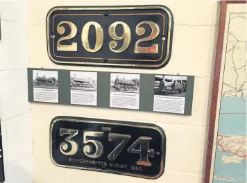  ??  ?? Numberplat­e of 2092 on temporary display at Didcot in 2016, together with that of Wolverhamp­ton-built ‘Metro tank’ 3574