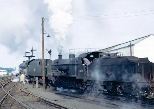  ?? R C Riley ?? To accommodat­e the influx of through passenger workings over the S&D on summer Saturdays, freight traffic was suspended. S&DJR Fowler ‘7F’ 2-8-0 No 53809 and Leeds (Holbeck)-allocated LMS Stanier 4-6-0 No 45739 Ulster are called off the S&D shed at Bath together to wait their respective turns relieving inbound trains on Saturday, 1 August 1962. The ‘Jubilee’ will no doubt return to Leeds on the Bradford (Forster Square) train, while the ‘7F’, which will have spent the week moving goods over the S&D, has been pressed into passenger service and is likely to have later worked the incoming train from Nottingham (Midland). There were few other locations that this combinatio­n could be found for the 2-8-0s rarely ventured further than Avonmouth or Gloucester on diagrammed freight workings, and those workings tended to be at anti-social hours.