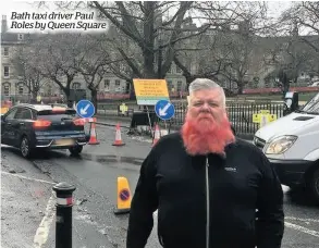  ??  ?? Bath taxi driver Paul Roles by Queen Square