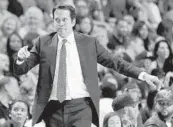  ?? JOE SKIPPER/AP ?? Miami Heat coach Erik Spoelstra directs his team against the Dallas Mavericks in the second half on New Year’s Day in Miami.