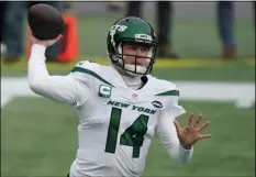  ?? CHARLES KRUPA - THE ASSOCIATED PRESS ?? FILE - New York Jets quarterbac­k Sam Darnold rolls out to pass against the New England Patriots in the first half of an NFL football game in Foxborough, Mass., in this Sunday, Jan. 3, 2021, file photo.