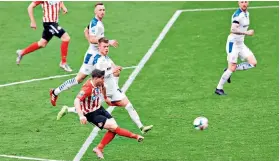  ??  ?? Slotting home: American midfielder Lynden Gooch scores Sunderland’s winner at Wembley