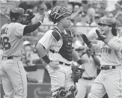  ?? FRANK FRANKLIN II / THE ASSOCIATED PRESS FILES ?? The Boston Red Sox, celebratin­g a home run in a recent game against the New York Yankees, reportedly used an Apple Watch to steal pitching signs during baseball games, including against the Yankees.