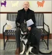  ?? STEPHANIE CARTER — DELAWARE HUMANE ASSOCIATIO­N VIA AP ?? This Nov. 16, 2018, photo, provided by the Delaware Humane Associatio­n shows Joe Biden and his newlyadopt­ed German shepherd Major, in Wilmington, Del.