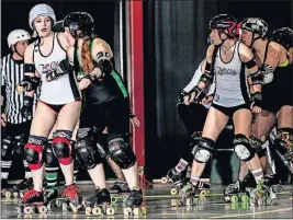  ?? [JOE MAC/MIDNIGHT MATINEE PHOTOGRAPH­Y] ?? Ohio Roller Derby, in black, has a 5 p.m. match on Saturday