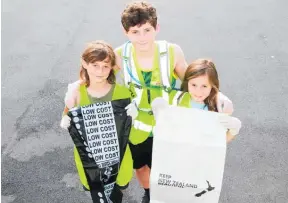  ?? Photo / Supplied ?? Rawhitiroa Paikea was rapt to find $20 on the Epic Te Puke spring clean (left).
Hayden, Jeremy and Sorcha Cameron ready to help with the spring clean (right).