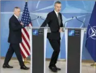  ?? VIRGINIA MAYO — THE ASSOCIATED PRESS ?? NATO Secretary General Jens Stoltenber­g, right, and U.S. Secretary of Defense Jim Mattis prepare to address a media conference at NATO headquarte­rs in Brussels on Wednesday.