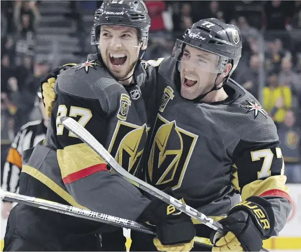  ?? ETHAN MILLER/GETTY IMAGES ?? Shea Theodore, left, Brad Hunt and the rest of the Vegas Golden Knights have conquered all this NHL season, smashing every expansion team record and proving in the process the adage that hard work beats talent.