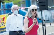  ?? NICOLAUS CZARNECKI / BOSTON HERALD ?? U.S. Rep. Katherine Clark joins U.S. Sen. Ed Markey at a rally in Malden in June.