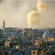  ?? (AFP) ?? Smoke rises from buildings following a strike on a rebel-held area of the Jobar district, east of the Syrian capital Damascus on Saturday