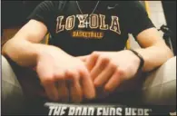  ?? The Associated Press ?? THE ROAD ENDS HERE: Loyola-Chicago guard Jake Baughman sits in the locker room before a practice session Friday in San Antonio ahead of the Ramblers’ matchup today with Michigan in the Final Four. The teams are scheduled to tip at 5:09 p.m. on TBS...