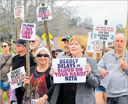  ??  ?? SH2 protesters on the Wairoa bridge on Sunday.
