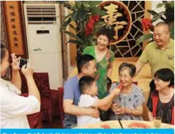  ??  ?? Shen Xuean (2nd R, front), 84, has a gathering with her family members at Jiu’an senior center in Nanxun Town of Huzhou City, east China’s Zhejiang Province, Sept. 13, 2019. (Xinhua/Tan Jin)