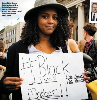  ??  ?? Sign of the times: A protester with a #blacklives­matter sign on O’Connell Street and (inset right) #oscarssowh­ite went viral