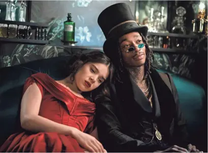  ?? PHOTOS BY APPLE TV PLUS ?? Hailee Steinfeld and Wiz Khalifa star in “Dickinson.”