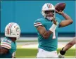  ?? CHRIS O’MEARA — THE ASSOCIATED PRESS ?? Miami Dolphins quarterbac­k Tua Tagovailoa (1) attempts to throw a pass, during the second half of an NFL football game against the New England Patriots, Sunday, in Miami Gardens, Fla. The Dolphins defeated the Patriots 22-12.