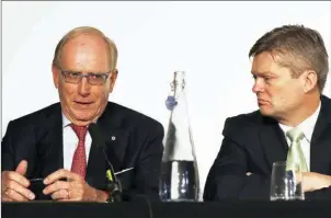  ?? ADRIAN DENNIS/AFP ?? Richard McLaren (left) sits alongside the chief investigat­or, Martin Dubbey, at a press conference following the publicatio­n of his report on Friday.