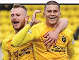  ??  ?? Happy days: Dykes’ (right) strike was his fourth of the season