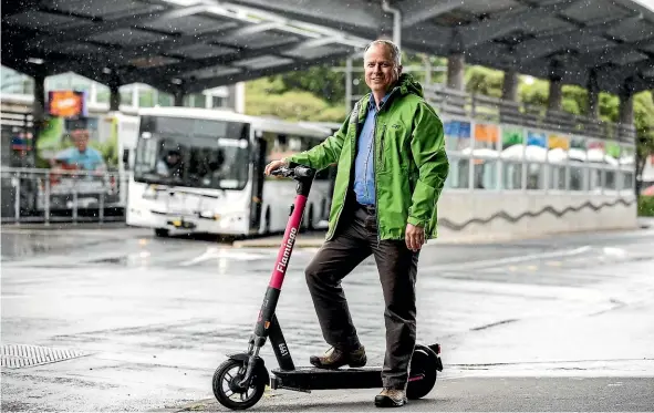  ?? DAVID UNWIN/STUFF ?? Palmerston North city councillor Brent Barrett has helped make it easier for colleagues to choose a bus or e-scooter ride over driving a car.