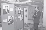  ?? ?? PRESIDENT & CEO, Alfred Xerez-burgos III, takes a moment to appreciate the gallery honoring Forest Lake’s five-year, 10-year, and 20-year service awardees. Their dedication and contributi­ons remain an integral part of the company’s success and legacy.