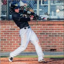  ?? TIM GODBEE / For the Calhoun Times ?? Calhoun’s Carson Kemp connects for a single during the first inning of Tuesday’s game against Ringgold.