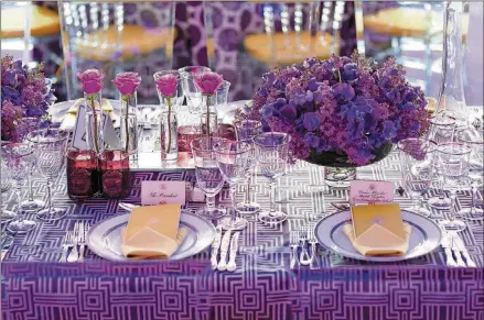  ?? GENEVIEVE DE MANIO ?? Bryan Rafanelli designed seven state dinners for the Obamas, including the one in honor of David Cameron where White House tables were decorated with purple roses and lilacs and a splash of green.