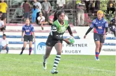  ??  ?? EDGING CLOSER ... the Sri Lanka women's team (green) are into the Cup semifinals and are just two matches away from retaining their Borneo Sevens title.