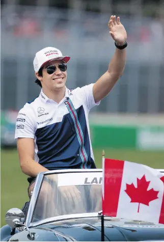  ?? ALLEN MCINNIS ?? Lance Stroll at the drivers’ parade before the Canadian Grand Prix at Circuit Gilles Villeneuve on Sunday. The Montrealer finished ninth, one lap behind winner Lewis Hamilton, after starting 17th.