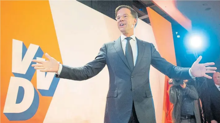  ?? AFP ?? Ganador. El primer ministro holandés, el liberal Mark Rutte, logró una clara victoria y ahora podrá formar gobierno. Durante la celebració­n sostuvo que fue “la derrota del populismo”.