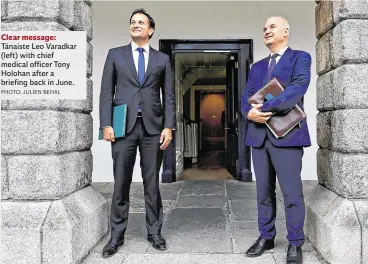  ?? PHOTO: JULIEN BEHAL ?? Clear message: Tánaiste Leo Varadkar (left) with chief medical officer Tony Holohan after a briefing back in June.
