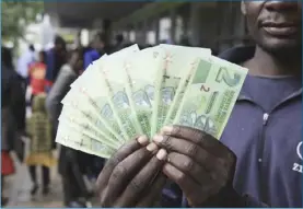  ?? ?? Bond notes and all electronic money were merged into a new currency called the RTGs