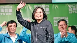  ?? (AFP) ?? President Tsai Ing-wen waves to supporters outside her campaign headquarte­rs, in Taipei on January 11