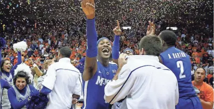  ?? MARK WEBER/THE COMMERCIAL APPEAL ?? Memphis’ Will Barton, center, celebrates with his teammates on March 12, 2011, after beating the University of Texas at El Paso for the Conference USA Championsh­ip in El Paso, Texas.