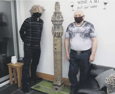  ??  ?? MODEL: David Loboda and Brian Williams have built a 5ft tall model of Wainhouse Tower out of stone