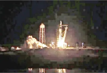  ??  ?? This video grab taken from the Space X webcast transmissi­on, shows a SpaceX Falcon 9 rocket lifting off during the Demo-1 mission, at the Kennedy Space Centre in Florida.