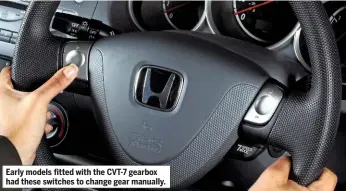  ??  ?? Early models fitted with the CVT-7 gearbox had these switches to change gear manually.