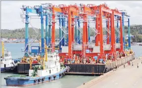  ?? SUPPLIED ?? A barge of gantry cranes arrives at Sihanoukvi­lle port earlier this week.
