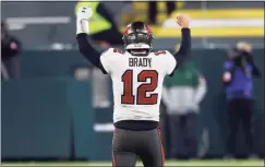  ?? Jeffrey Phelps / Associated Press ?? Buccaneers quarterbac­k Tom Brady reacts after winning the NFC championsh­ip game against the Packers on Sunday.