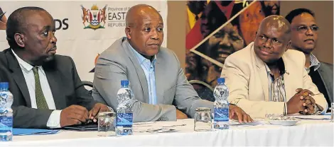  ?? Picture: WERNER HILLS ?? BACK TO BASICS: Phumulo Masualle, second from left, gives the keynote address at the public service month programme at the East Cape Training Centre in Zwide. With him are, left, Litho Suka, Bay mayor Mongameli Bobani, second from right, and acting city manager Keith Meyer