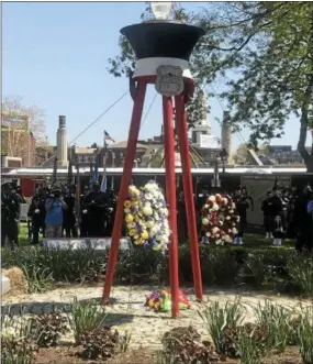  ?? GINGER RAE DUNBAR – DIGITAL FIRST MEDIA ?? The Living Flame Memorial Service at Franklin Square Park in Philadelph­ia on Wednesday honored fallen firefighte­r Matthew LeTourneau, of Springfiel­d, and Kenneth Greene, of Philadelph­ia.