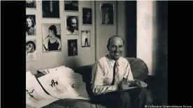  ??  ?? Rene Hubert working on sketches in his Paramount studio in 1932