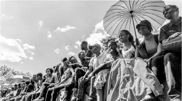  ??  ?? University of Zimbabwe students take part in a demonstrat­ion in Harare to demand the withdrawal of Mugabe’s doctorate and refused to sit their exams as pressure builds on the Zimbabwe President to resign. — AFP photo